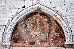 Ancient icon on the wall of an ancient Christian temple. Croatia