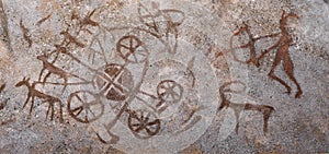 Ancient images on the wall of the cave ocher.
