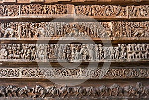 Ancient images on the walls. Carvings in Hoysaleshwara Hindu temple