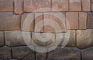 Ancient inca stone wall in the city of Cusco, Peru