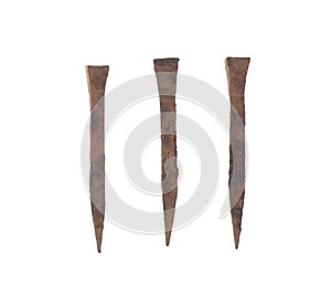 ancient iron rusty nails isolated on white