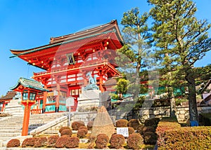 Ancient japanese wood gate and garden with blue sky, Kyoto, Japan