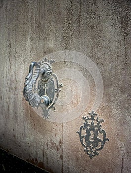 Ancient Keyholes on a wooden door