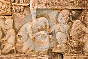 Ancient Khmer carving lice picking