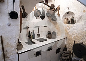 Ancient kitchen inside Casa Grotta di vico Solitario Matera, Itay photo