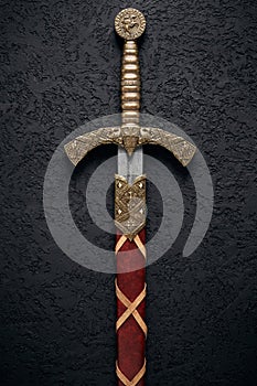 Ancient knightly sword of the era of the Crusades in the Middle Ages