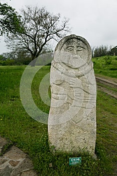 Ancient kurgan stelae in the Khortytsia isalnd, Zaporizhia, Ukraine photo