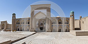The ancient Kutlug-Murad-Inaka madrasah (panorama). Khiva, Uzbekistan photo
