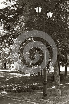 An ancient lantern with road signs in the historical center of Chernigov