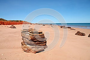 Ancient layered rocks on prehistoric beach near Broome, Western Australia