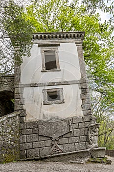 The ancient leaning house inside the park of monsters in Bomarzo, Italy