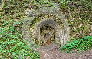 Ancient lime kiln in the woods of Trentino Alto Adige, near Racines in Italy photo