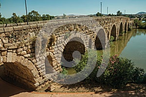 The ancient long bridge still in use over the Guadiana River at Merida