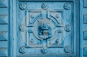 Ancient luxury door with lion sculpture