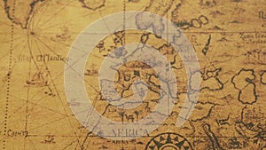 Ancient map of the world with compass