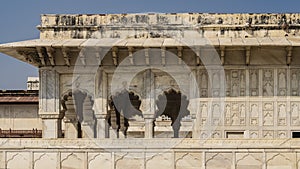 The ancient marble palace of Divan-i-Khas against the blue sky.