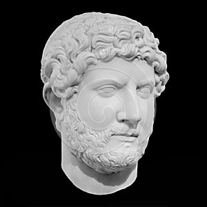 Ancient marble sculpture of the roman emperor Hadrian isolated on black with clipping path