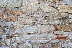 Ancient masonry wall texture, stonework pattern background. Old stone wall