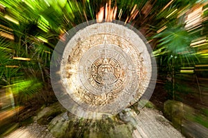 Ancient Mayan calendar in the jungle photo