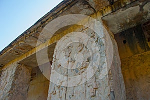 Ancient Mayan carved relief with in temple ruins. Mayan ruins in Palenque, Chiapas, Mexico