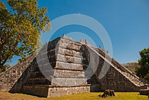 Ancient Mayan pyramid with steps. The old ruined city of the Maya. Chichen-Itza, Mexico. Yucatan