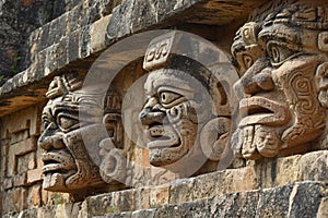 Ancient mayan stone carvings on temple wall