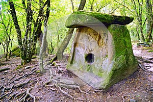 Ancient megalithic construction - the tile of the dolmen, the village of Pshada