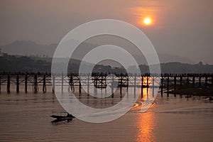 Ancient mon wooden bridge in songgaria river Sangkhla Buri District kanchanaburi thailand