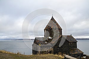 Ancient monastery of Sevanavank in Armenia with the Sevan Lake in the background