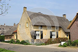 Ancient thatched roof houses in Tricht, Betuwe, Netherlands photo