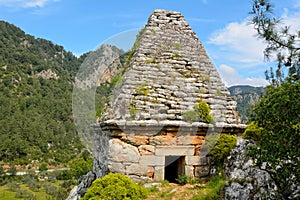 Ancient monumental tomb dating from Hellenistic period in Turgut village near Marmaris resort town in Turkey.