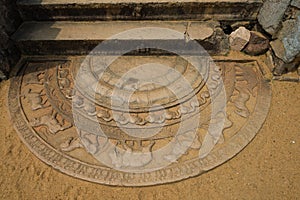 Ancient moonstone at the Buddhist temple. Anuradhapura