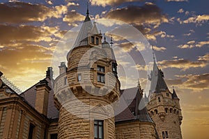 The ancient Moszna castle and palace outdoors, closeup. Poland