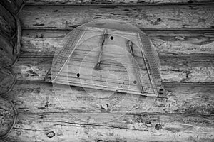 Ancient musical instrument gusli on the wooden wall. Toned