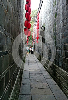 A ancient narrow alley in Chinese style ,with red latterns