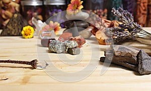 Ancient Native American Pottery Pieces With Crystals and Flowers on Meditation Table