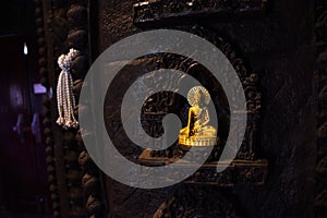 Ancient old buddha in antique ruin ubosot of Wat Khao Sanam Chaeng Temple for thai people traveler travel visit and respect