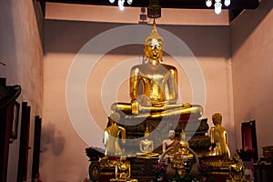 Ancient old buddha in antique ruin ubosot of Wat Mae Nang Pleum or Maenangpluem Temple for thai people travelers visit respect