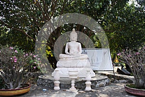 Ancient old buddha in antique ruin ubosot of Wat Tham Khao Prathun Temple for thai people traveler travel visit respect praying