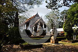 Ancient old ordination hall or antique ruin ubosot for thai travelers people travel visit respect praying blessing buddha wish