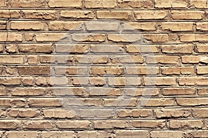 An ancient old rough drystone wall. Background photo. Texture pattern.