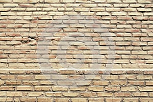 An ancient old rough drystone wall. Background photo. Texture pattern.