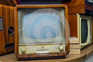 Ancient old television set show in the electrical stores. Old vintage television set