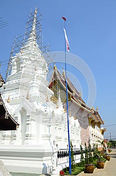 Ancient ordination hall or antique old ubosot and chedi stupa for thai travelers people travel visit and respect praying blessing