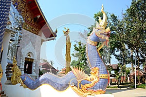 Ancient ordination hall antique old ubosot and sculpture naga or carving naka statue for thai people travel visit respect praying