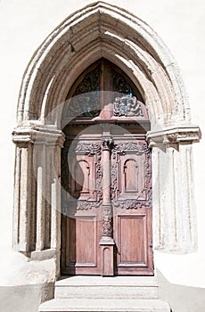 Ancient ornate door to the medieval church