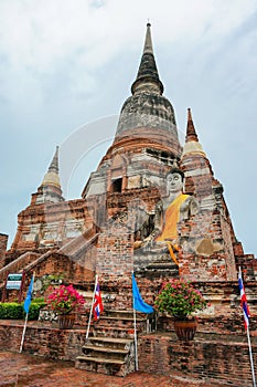 Ancient pagoda and buddha statue in Ayutthaya, Thailand