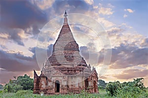Ancient pagodai n the landscape from Bagan in Myanmar at sunrise