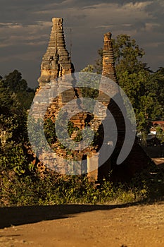 Ancient pagodas and stupas overrun with plants