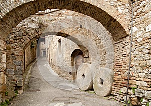 Ancient pedestrian root with millstones